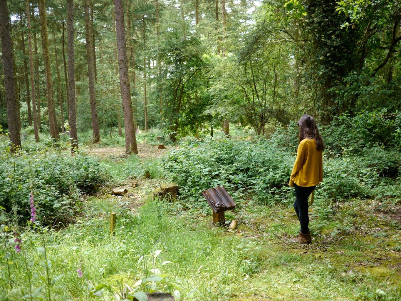 standing at funeral of her loved one