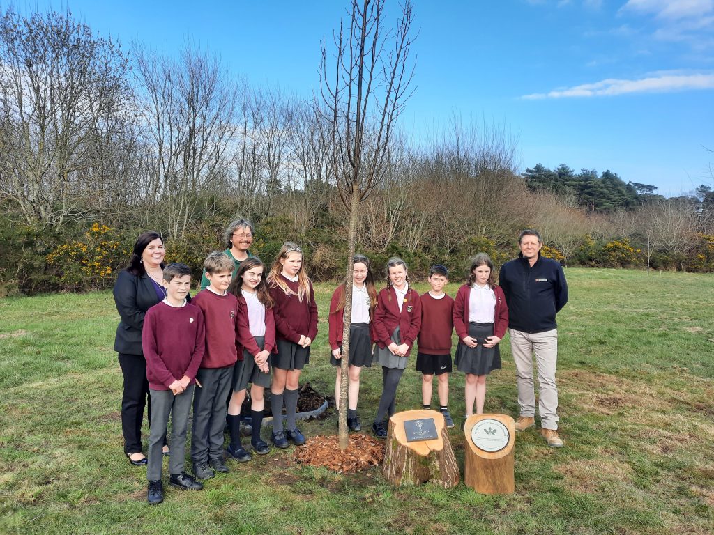 Pupils from Grayshott CE Primary School with Jeni Putland, Park Manager and Craig Rogers-Jones, Grounds Manager at GreenAcres Heatherley Wood Cemetery and Ceremonial Park along with Glenn Myers, Managing Director from Grayshott Primary